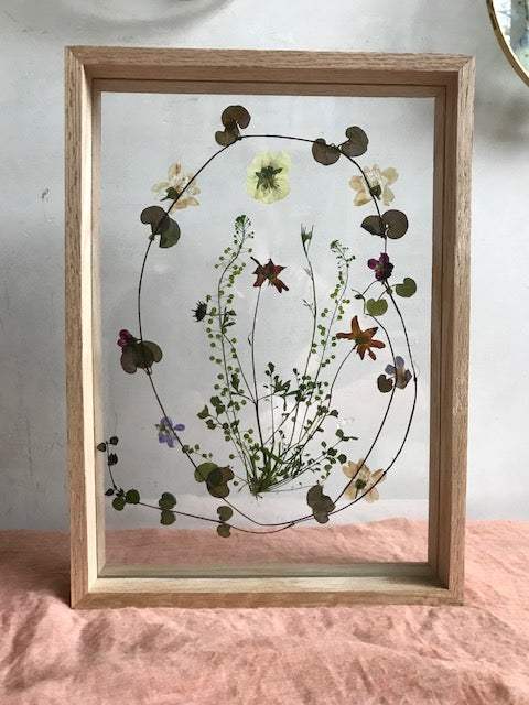 oak freestanding frame with dried flowers