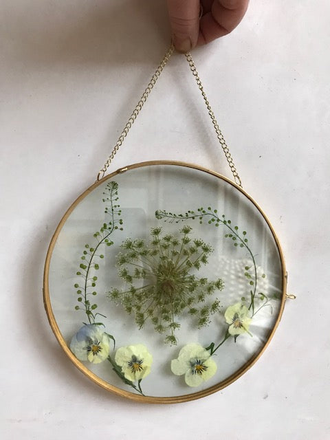 brase frame dried flowers
